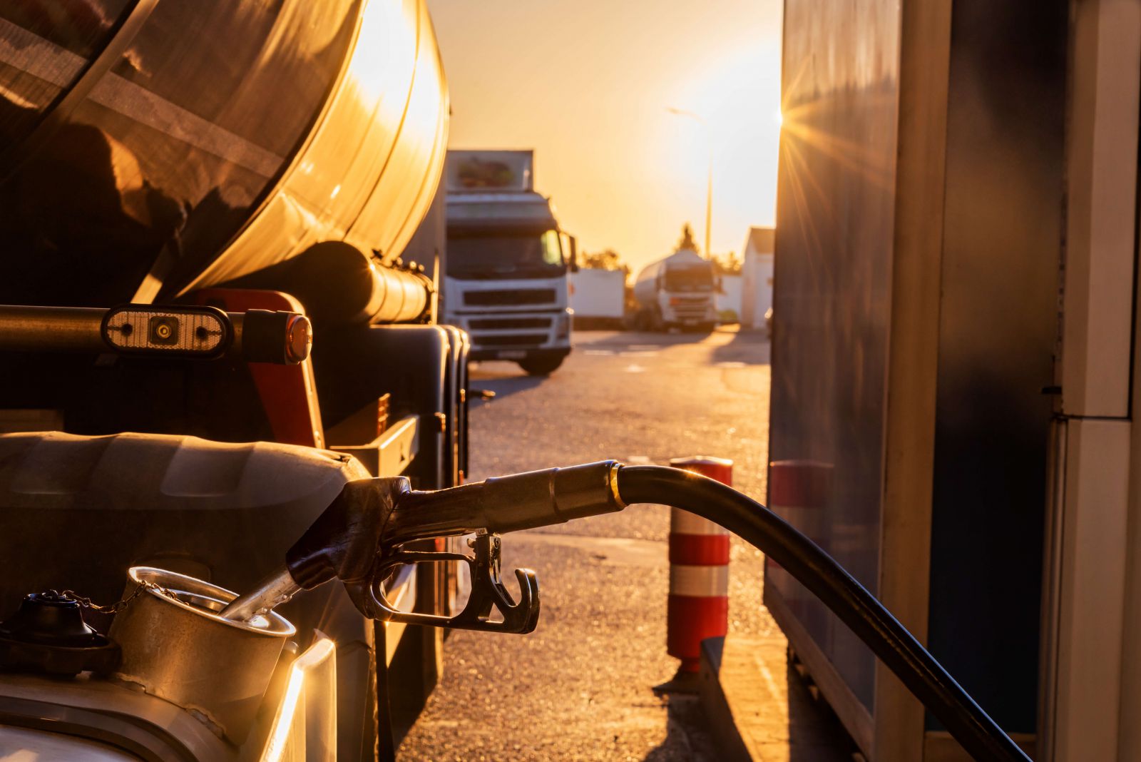 Fuel truck refilling at dusk