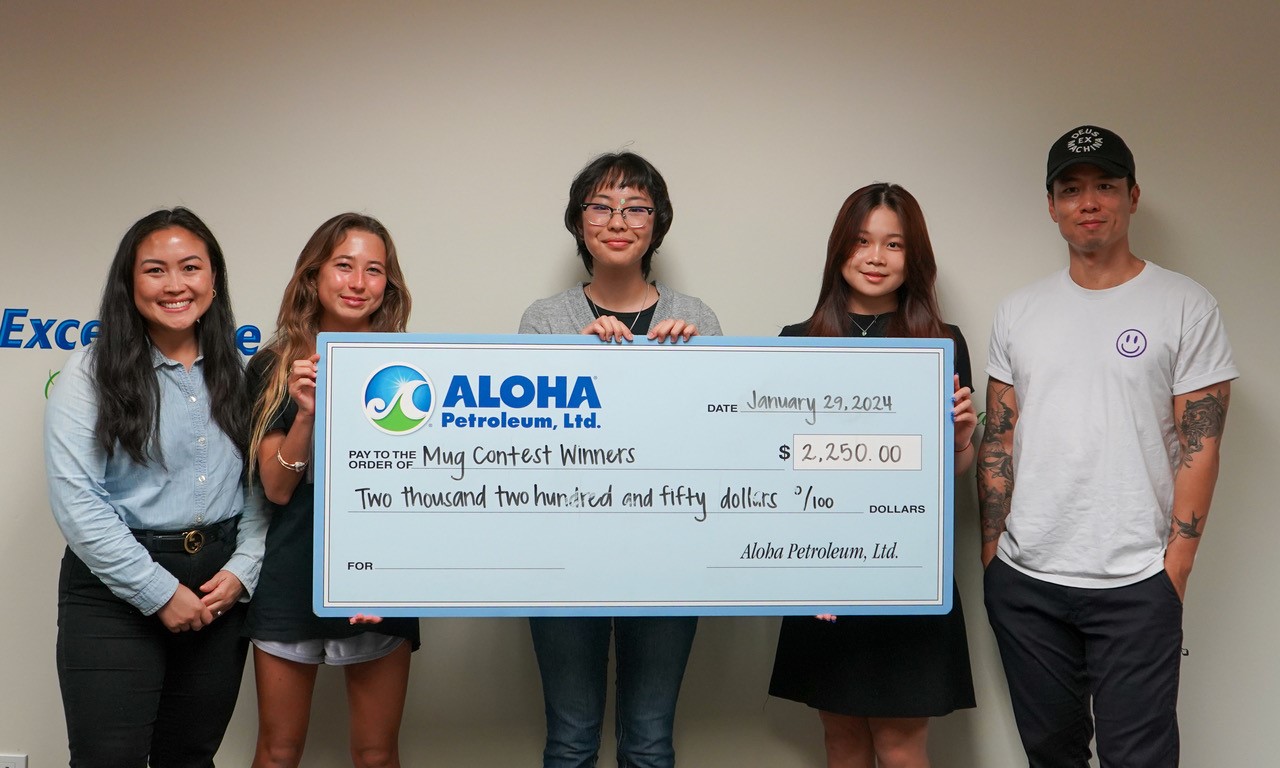 Mug design contest winners presented with check